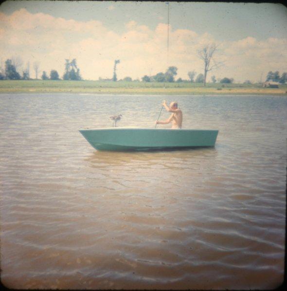 dadcanoeingwithagoose.jpg - Dad out on the pond in Cranbrook.