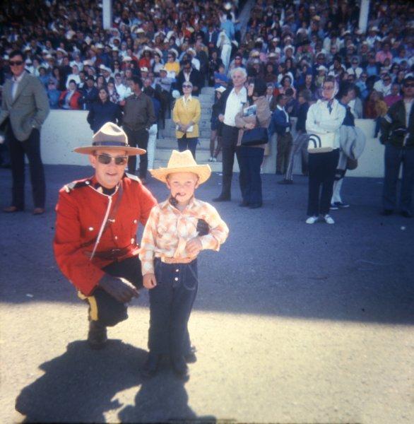 meandamontieatthecalgarystampede.jpg - Me hanging out with a Mountie at the Calgary Stampede.