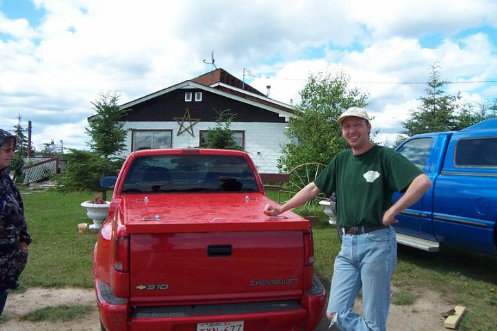 littleredchevy.jpg - Just finished the cover for the bed of the pickup.