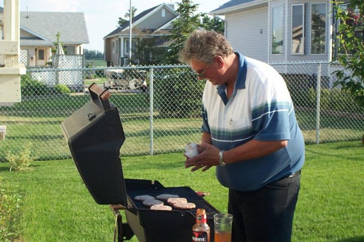 rudybbqing.jpg - Rudy BBQing for Barb & Susan's birthday.